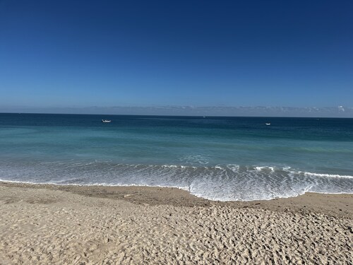Cosy ground floor apartment in house on a private beach.