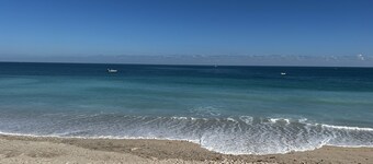 Cosy ground floor apartment in house on a private beach.