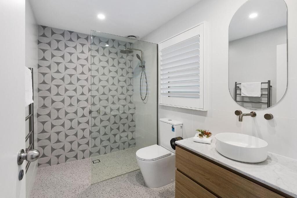 Designer toiletries, hair dryer, towels, soap