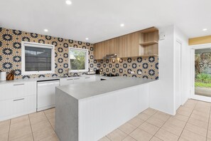 Deluxe House, 2 Bedrooms, Fireplace, Garden View | Private kitchen | Full-size fridge, microwave, oven, stovetop - Terrace Lofts Apartments (Ocean Grove)