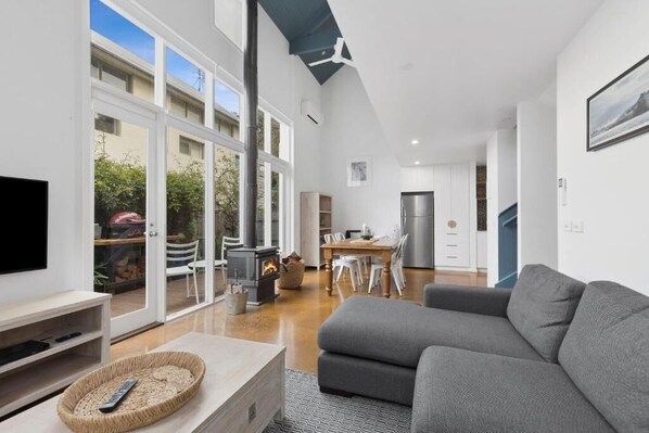 52-inch Smart TV with premium channels, fireplace, Netflix - Terrace Lofts Apartments (Ocean Grove)