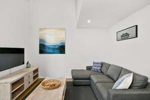 52-inch Smart TV with premium channels, fireplace, Netflix - Terrace Lofts Apartments (Ocean Grove)