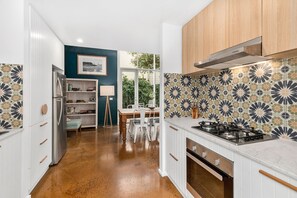 Deluxe Apartment, Fireplace, Garden View | Private kitchen | Full-size fridge, microwave, oven, stovetop - Terrace Lofts Apartments (Ocean Grove)