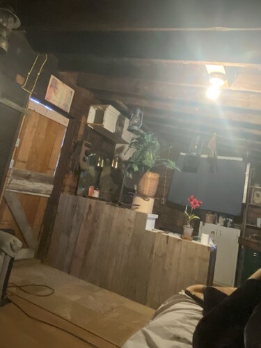 Outdoor housing with Air conditioning and propane shower