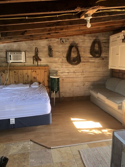 Outdoor housing with Air conditioning and propane shower