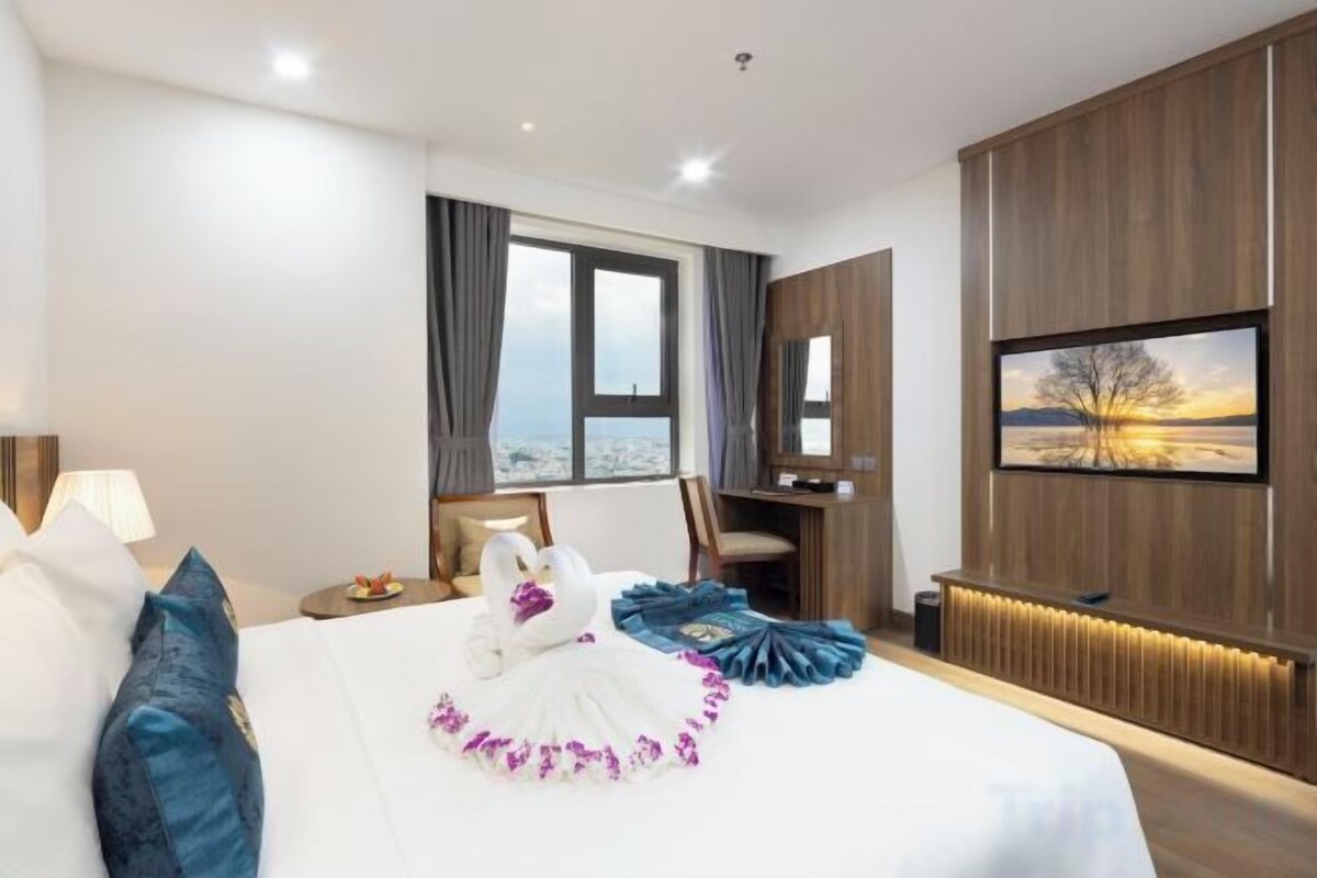 Luxe beddengoed, een minibar met enkele gratis items