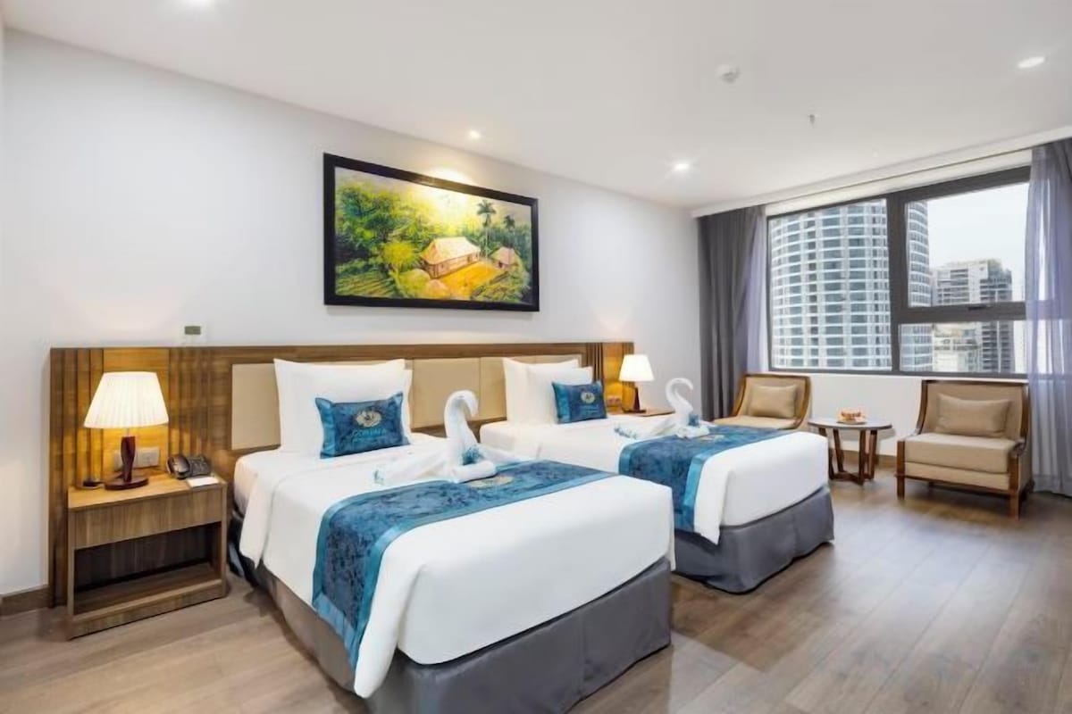 Luxe beddengoed, een minibar met enkele gratis items