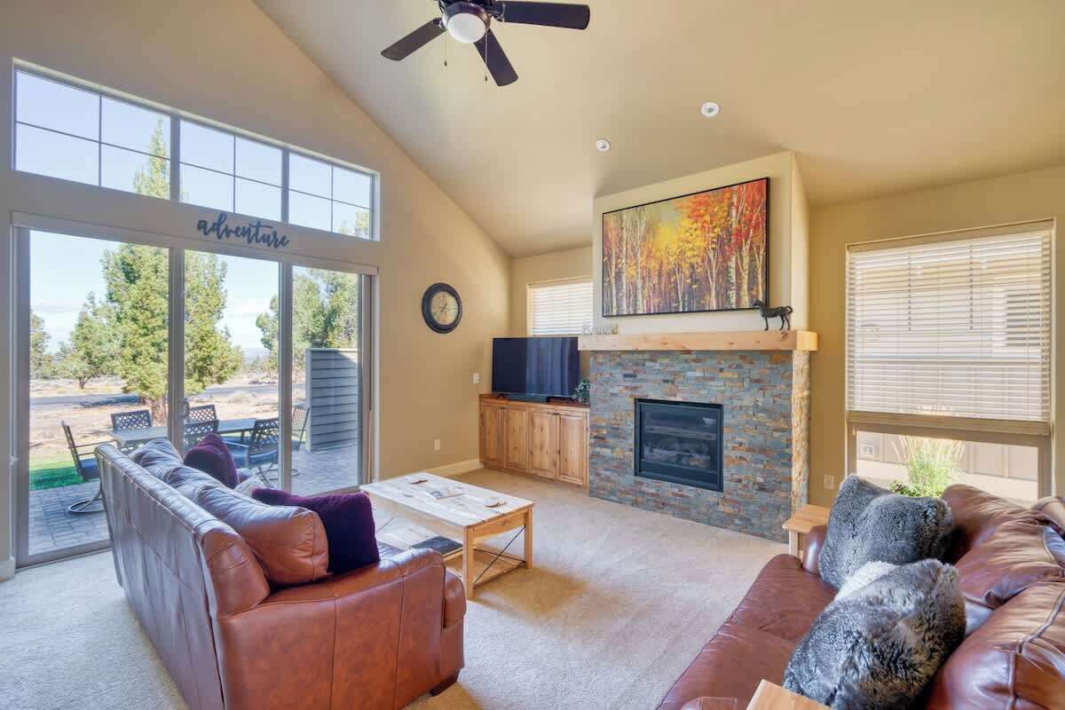 Cozy living room with a fireplace and TV—perfect for unwinding and enjoying your getaway!