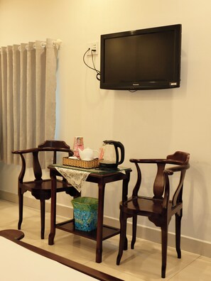 Chambre quadruple Deluxe | Literie de qualitĂ©, minibar, bureau, rideaux dâobscurcissement
