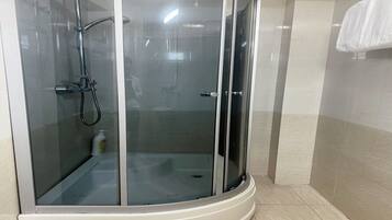 Shower, hair dryer, slippers, bidet