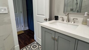 Hair dryer, towels, soap, toilet paper