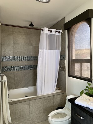 Hair dryer, towels, soap, shampoo