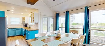 Canal view retreat with vaulted ceilings & three-story observation deck