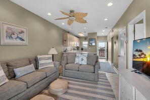 Condo, Multiple Beds (Baywatch C8) | Living area | TV - Baywatch C8 (Pensacola Beach)
