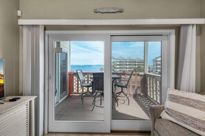 Condo, Multiple Beds (Baywatch C8) | Living area | TV - Baywatch C8 (Pensacola Beach)