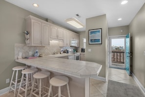 Condo, Multiple Beds (Baywatch C8) | Private kitchen | Oven, toaster, paper towels
