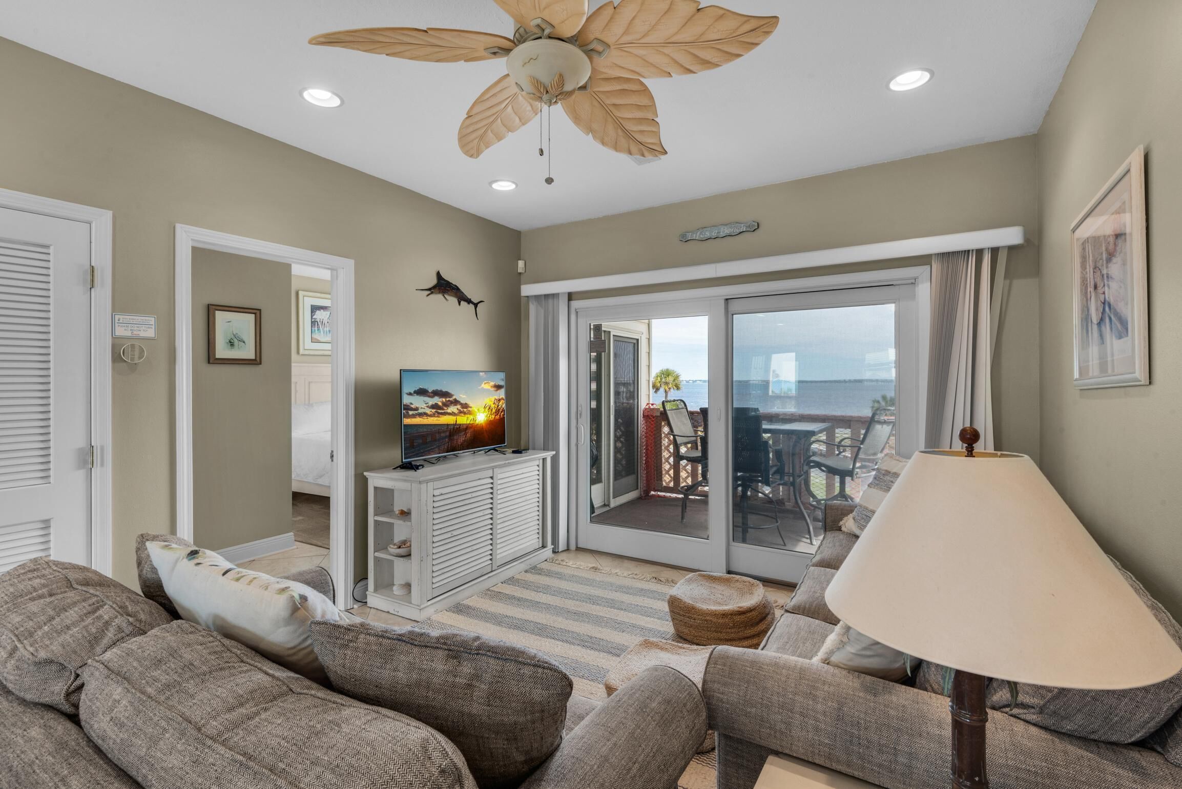 Condo, Multiple Beds (Baywatch C8) | Living area | TV