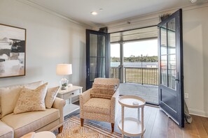 TV, books - Idyllic Savannah Apartment w/ River Views! (Savannah)