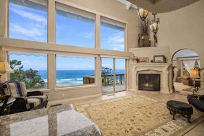 TV, fireplace, books