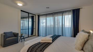 4 bedrooms, desk, laptop workspace, iron/ironing board