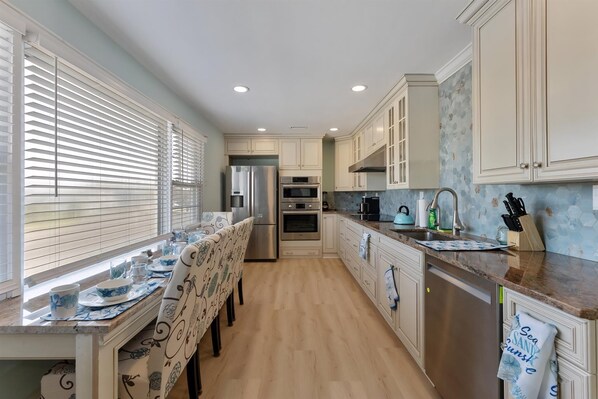 Fridge, oven, dishwasher, coffee/tea maker