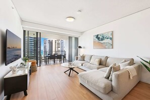 TV, offices - Ocean View 3-Bed with Gym, Pool, Sauna & Parking (Broadbeach)
