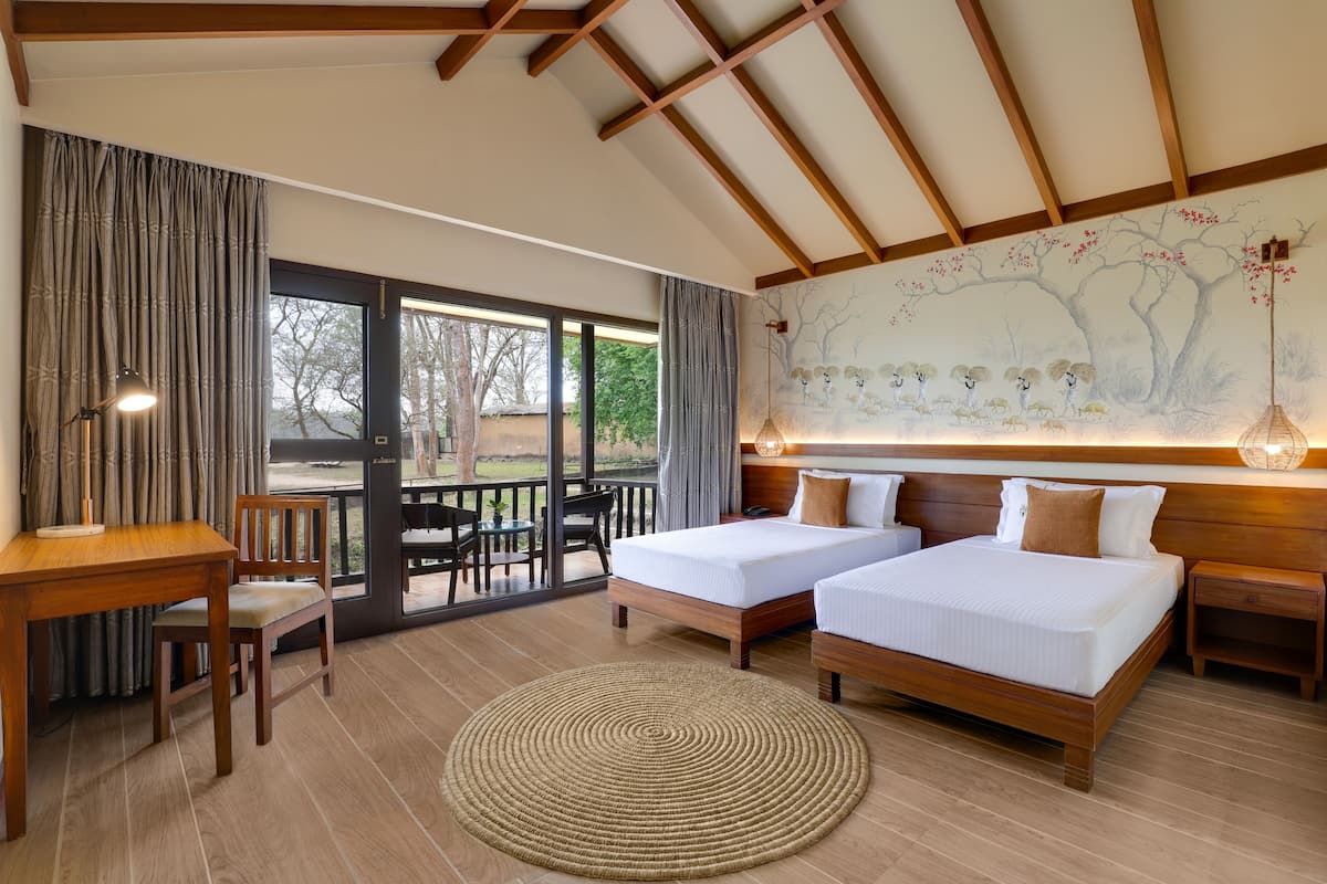 Deluxe Twin Cottage | Brankas, meja kerja, tirai kedap cahaya, dan kedap suara