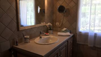 Shower, hair dryer, towels, soap