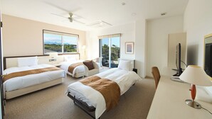 A hotel room with two beds, a desk, a chair, a TV, and a balcony with a view. - HOTEL HOLISTIC RESORT (Taiji)