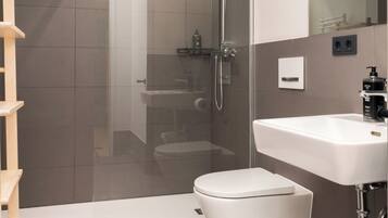 Eco-friendly toiletries, hair dryer, towels, soap
