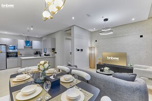 Apartment, 3 Bedrooms, Kitchen | Living area | 55-inch Smart TV with satellite channels - bnbmehomes - Pvt Rooftop in Al Malqa -C4 (Riyadh)