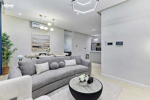 Apartment, 3 Bedrooms, Kitchen | Living area | 55-inch Smart TV with satellite channels
