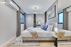 อพาร์ทเมนท์, 3 ห้องนอน, ห้องครัว | 3 ห้องนอน, เครื่องนอนระดับพรีเมียม, ตู้นิรภัยในห้องพัก, เตียงเสริม/เปล
