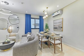 Apartment, 3 Bedrooms, Kitchen | Living area | 55-inch Smart TV with satellite channels