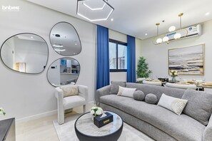 Apartment, 3 Bedrooms, Kitchen | Living area | 55-inch Smart TV with satellite channels