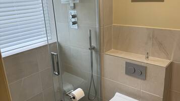 Shower, towels, soap, shampoo
