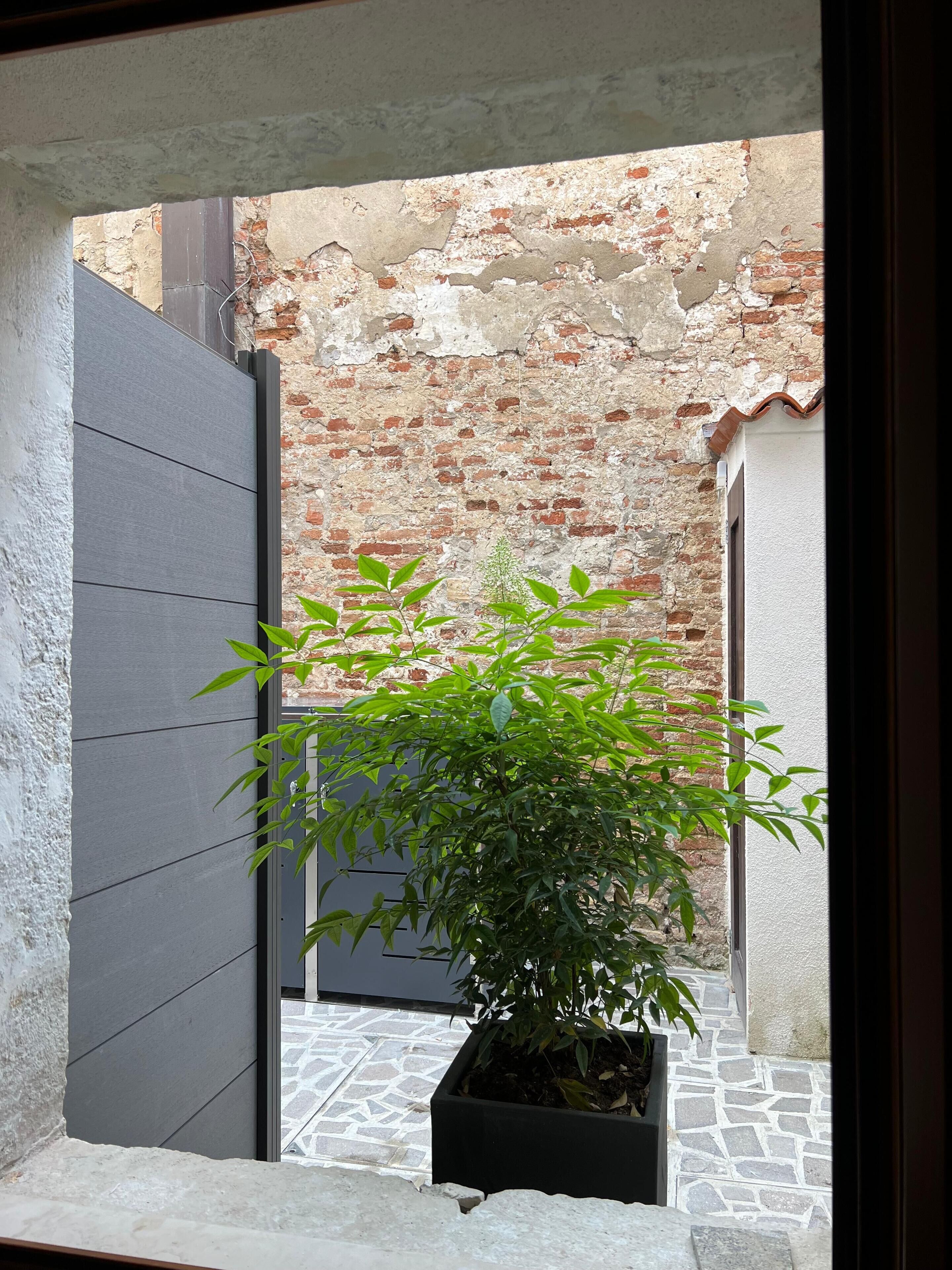 Căn hộ tiện nghi đơn giản, quang cảnh sân vườn (Smooth) | Quang cảnh sân vườn