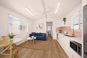 Deluxe Riverview Cabin | Living area - Camp Jordans (Port Macquarie)