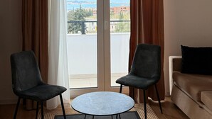 Studiosuite – basic, balkong, strandutsikt | Oppholdsområde