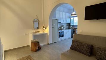 Suite, Private Pool | Living area | Smart TV