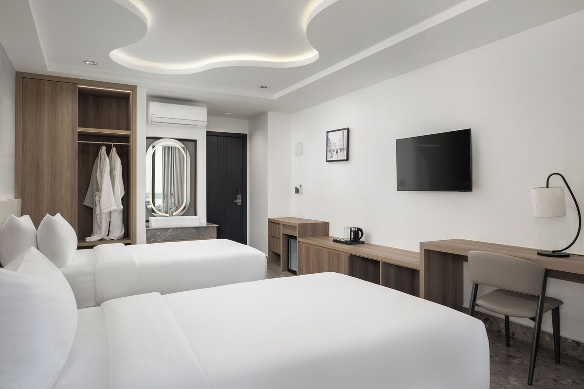 Ropa de cama de alta calidad, colchones con pillow-top y minibar 