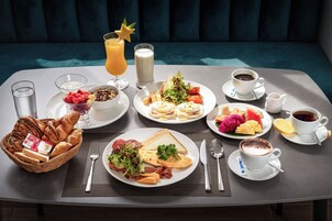 Daily buffet breakfast (USD 12.5 per person)