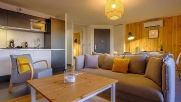 Superior Suite, 2 Bedrooms, Terrace | Living area | 106-cm flat-screen TV with cable channels