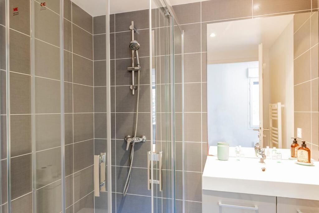 Standard Suite, 1 Bedroom | Bathroom | Shower, rainfall showerhead, hair dryer, towels