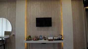 Minibar, desk, laptop workspace, iron/ironing board