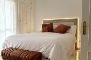 2 bedrooms, desk, iron/ironing board, travel cot