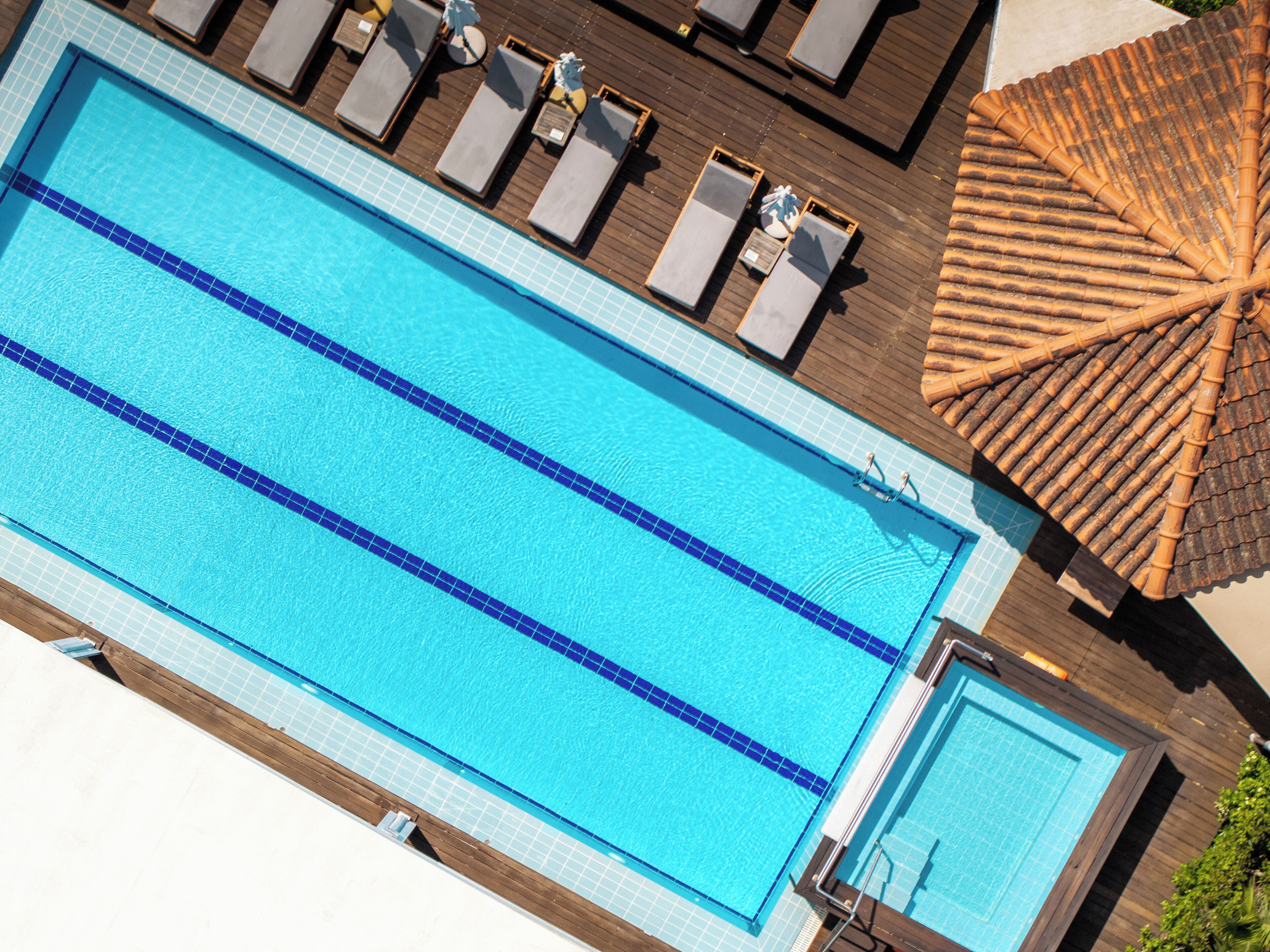 Seasonal outdoor pool, pool umbrellas, pool loungers