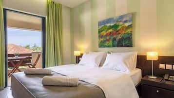 Standard Room with Garden View | 1 quarto, roupas de cama premium, cofres nos quartos