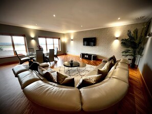 Deluxe Cottage | Living area | Flat-screen TV - The Cottage at The Vu (Bathgate)