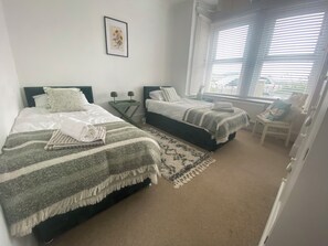 Apartemen | 2 kamar tidur, setrika/meja setrika, Wi-Fi gratis, dan seprai linen